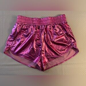 Makarthy shiny metallic pink athletic short shorts with pockets in size Medium.